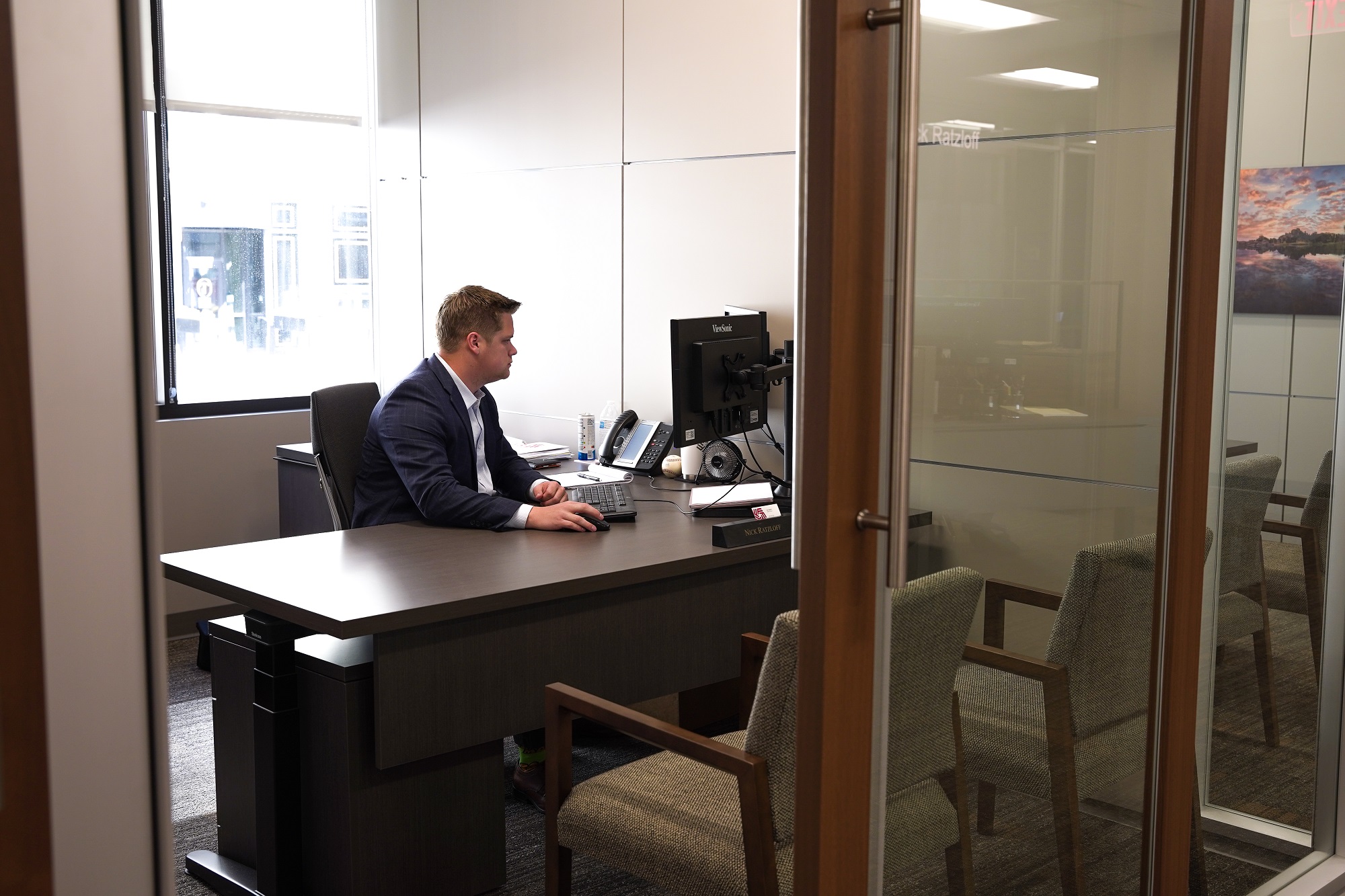 Wealth Advisor Nick Ratzloff is hard at work in his new office.