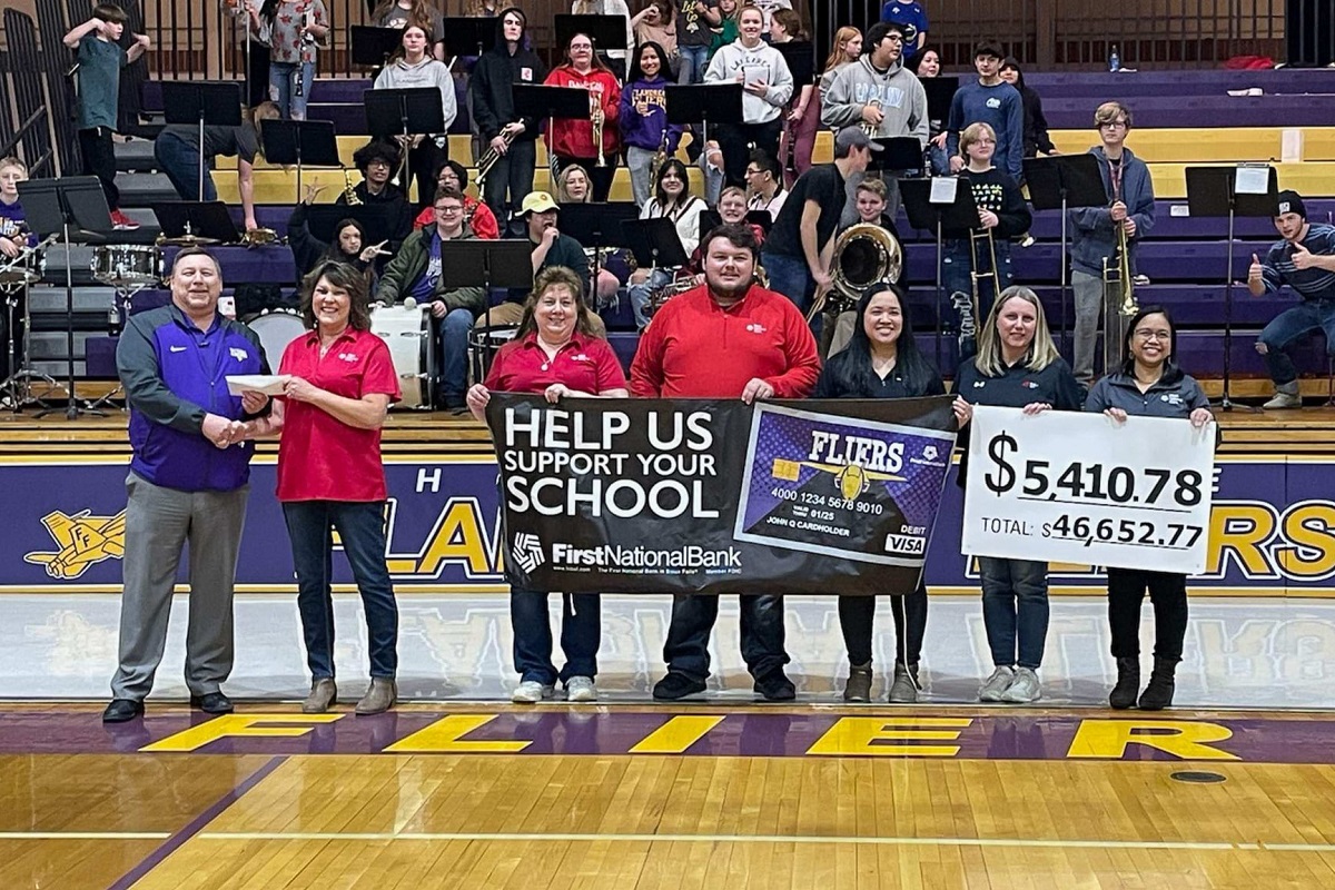 First National Bank giving back to the Flandreau School District with a Community Card distribution.