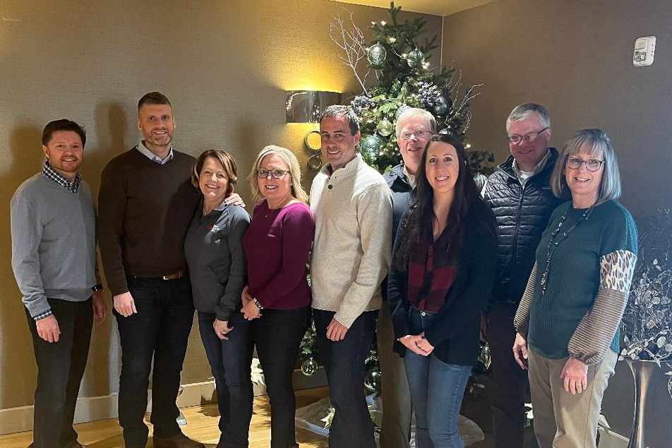 The First National Bank executive team poses for a group picture.