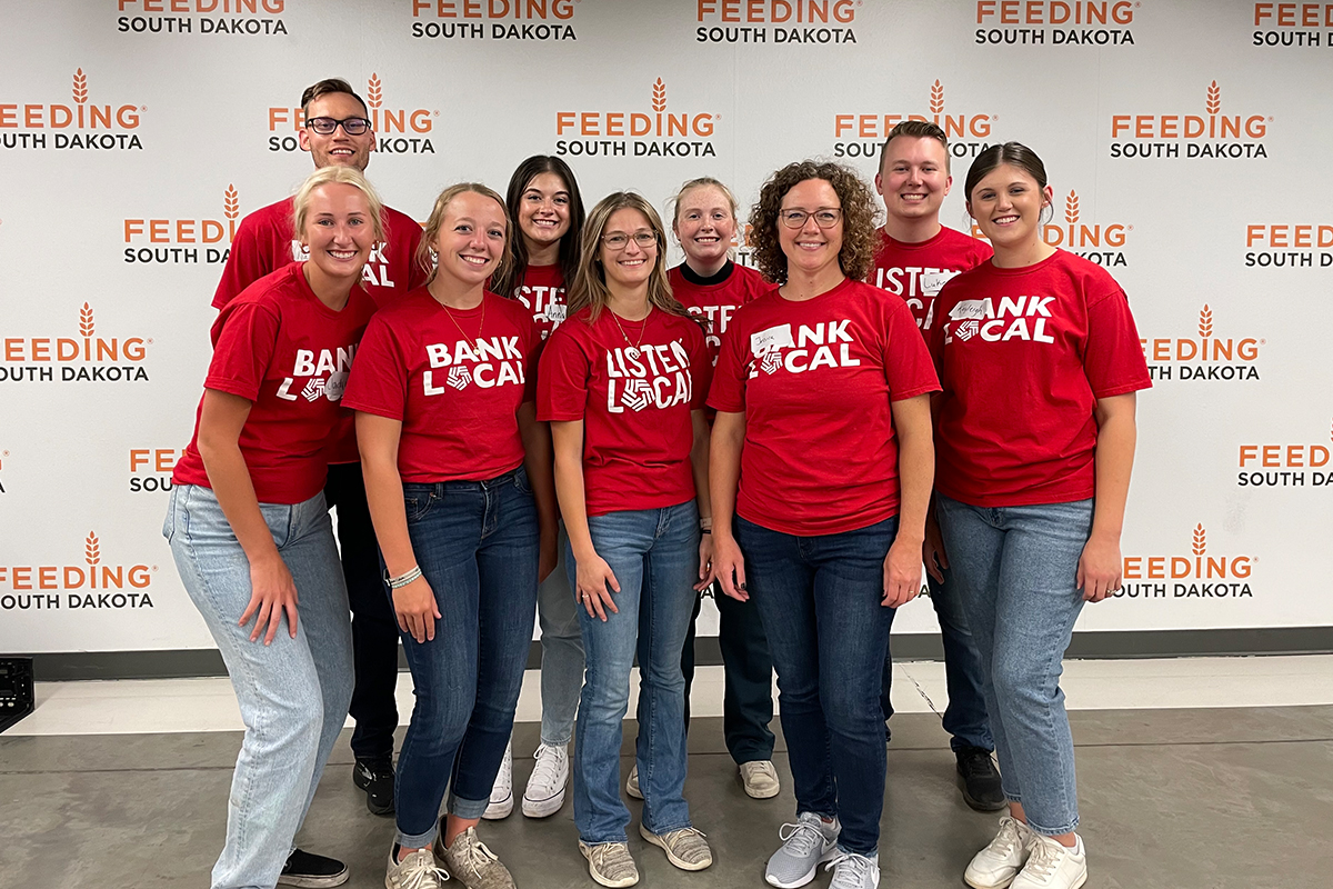 Interns from The First National Bank in Sioux Falls pose for a group photo at Feeding South Dakota