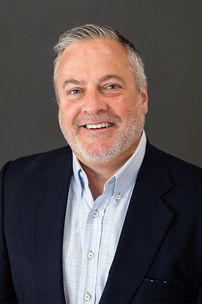 Headshot of John Henkhaus, family office head at The Everist Company