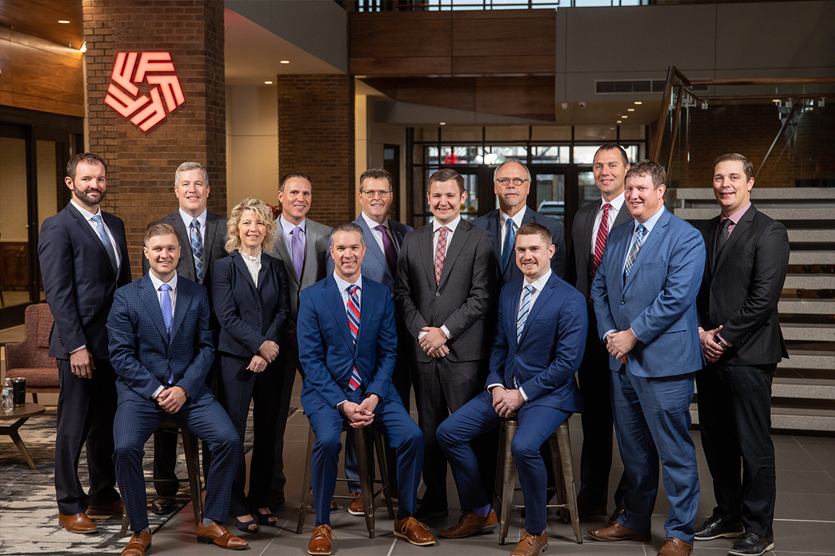 The Business Banking team at First National Bank poses for a group picture in the Bank's main lobby.