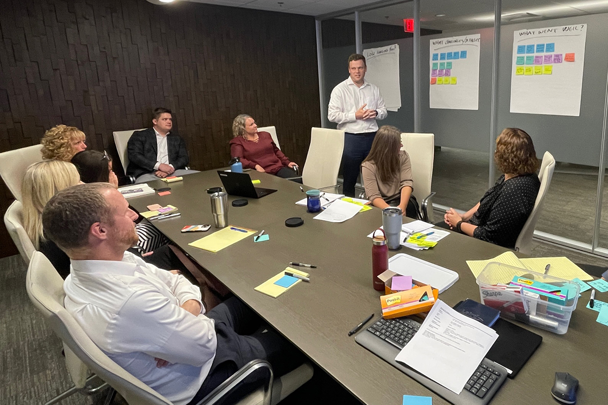 Members of the client experience task force compare notes on creating an ideal client experience.