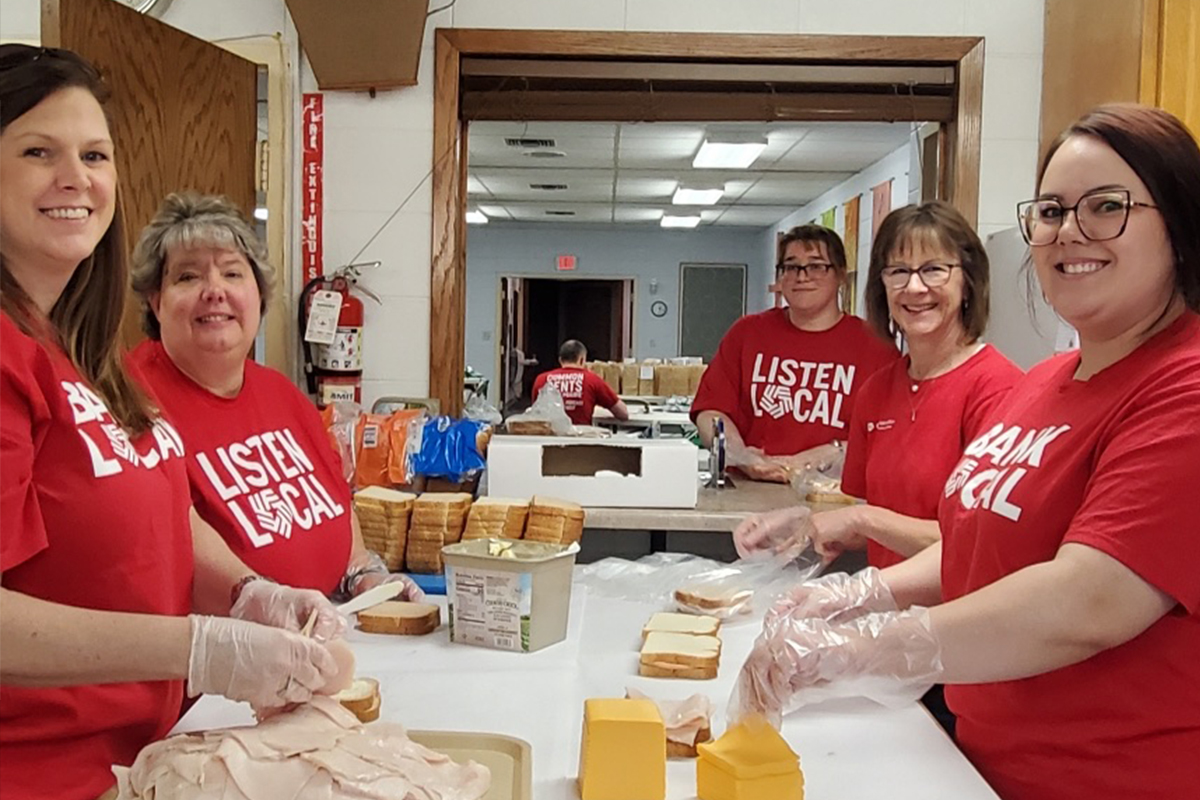 First National Bank employees making lunches at Lunch Is Served.