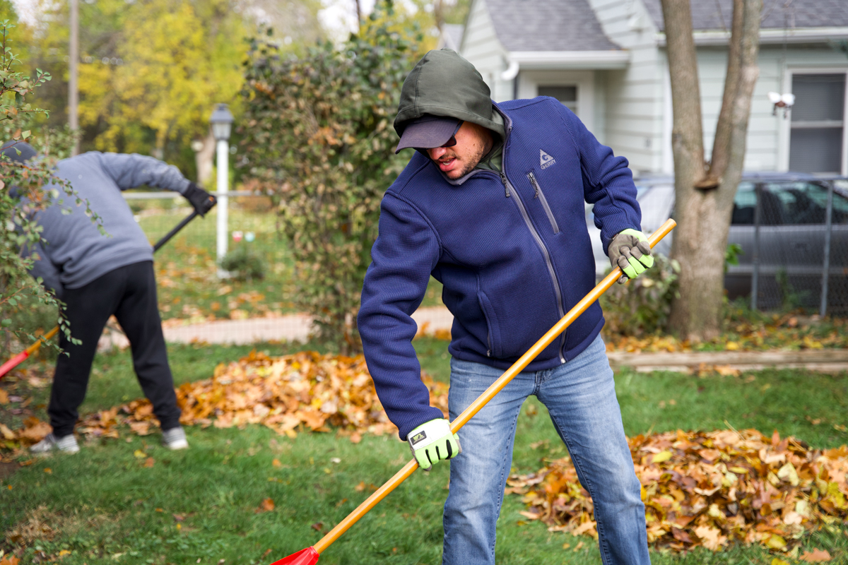 Chase Hoffman raking leaves at the annual Rake the Town event.