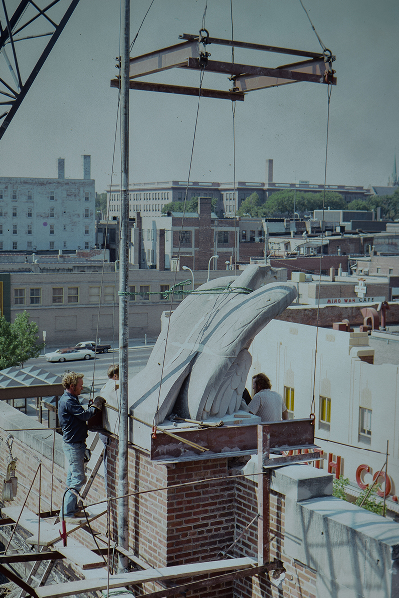 A construction crew moving First National Bank's eagle, which overlooks downtown Sioux Falls.