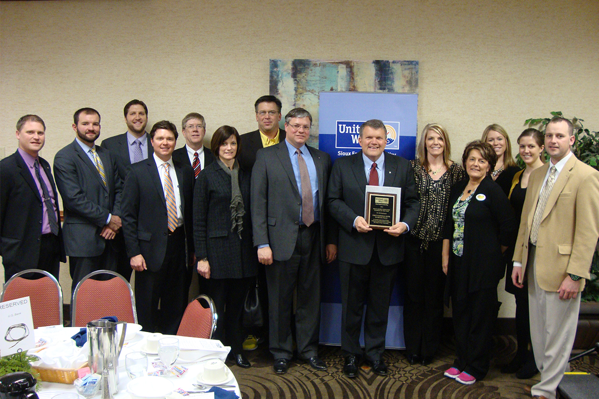 First National Bank accepting the award for Business of the Year from the Sioux Empire United Way.