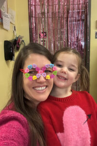 Maggie Groteluschen and her daughter at a school Valentine's Day party.
