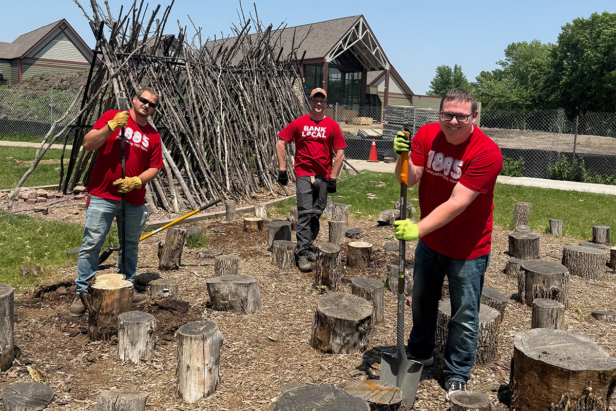 Volunteers replacing stepping stumps.