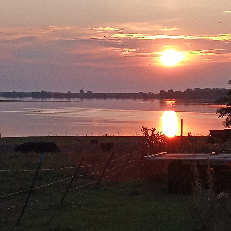 A sunset over a lake in rural South Dakota.
