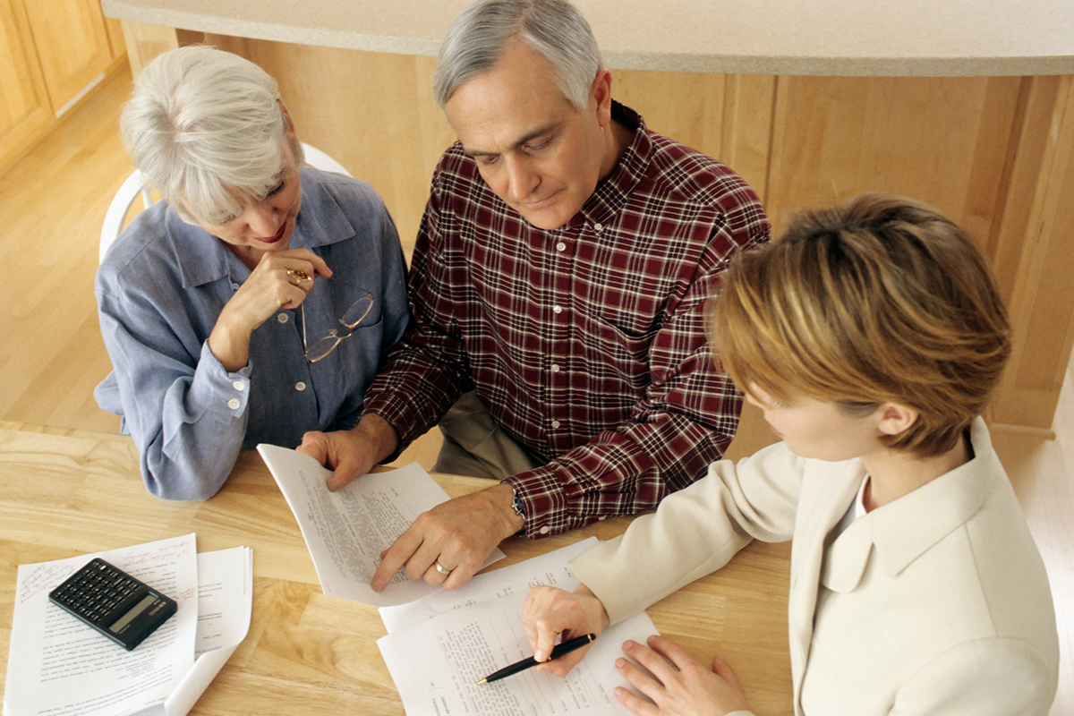 An older couple doing estate planning.