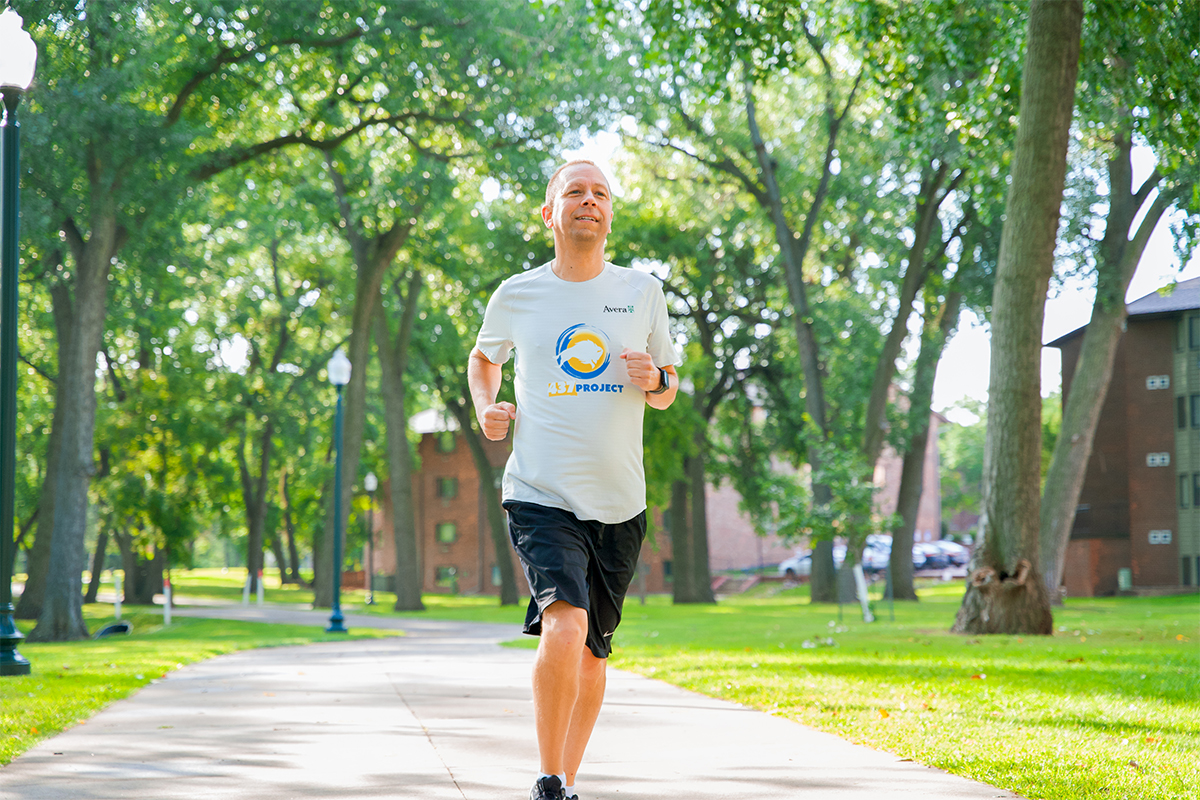 Tony Goettsch running for The 437 Project.