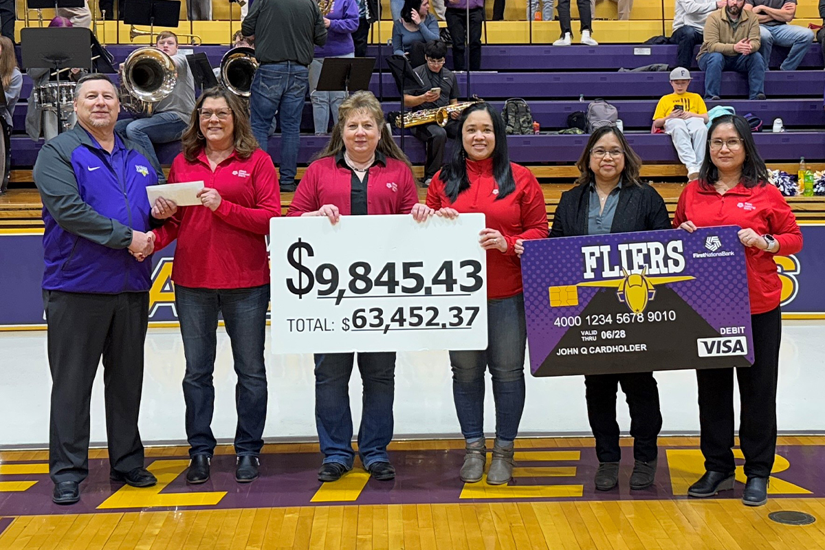 First National Bank presenting a check to the Flandreau School District.
