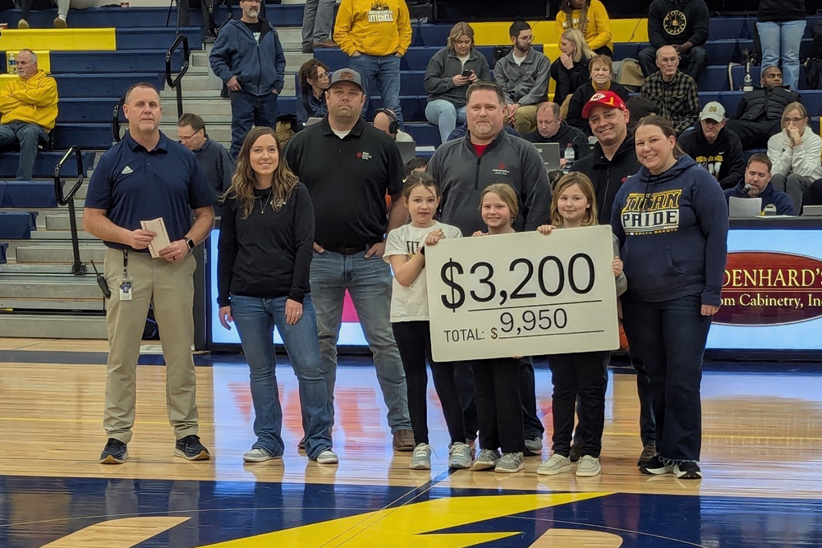 First National Bank presenting a check to the Tea Area School District.