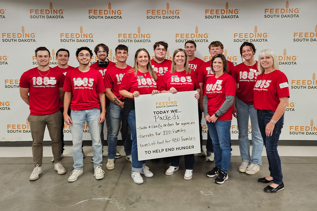 A group of people volunteering at Feeding South Dakota.