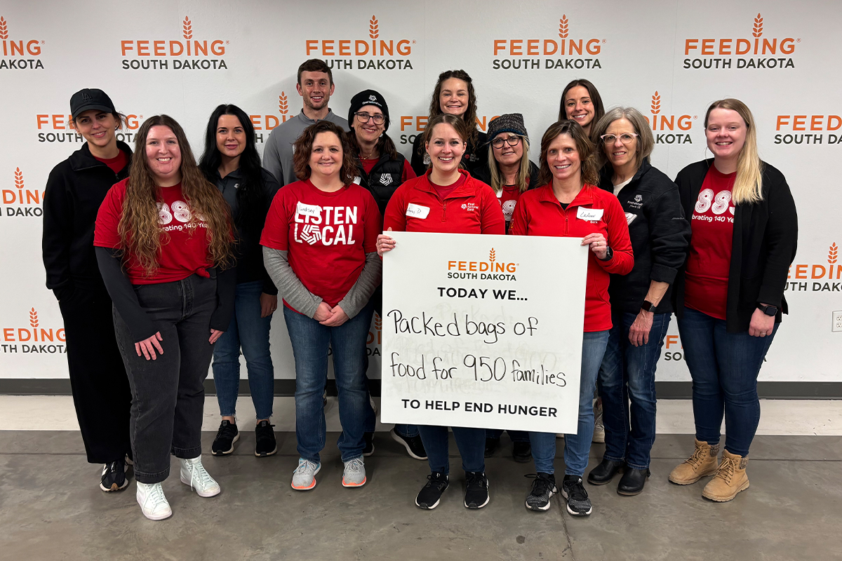A group of people volunteering at Feeding South Dakota.