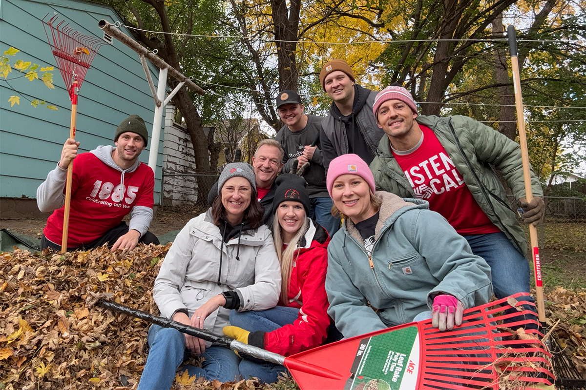 A group of people volunteering with Rake the Town in Sioux Falls.