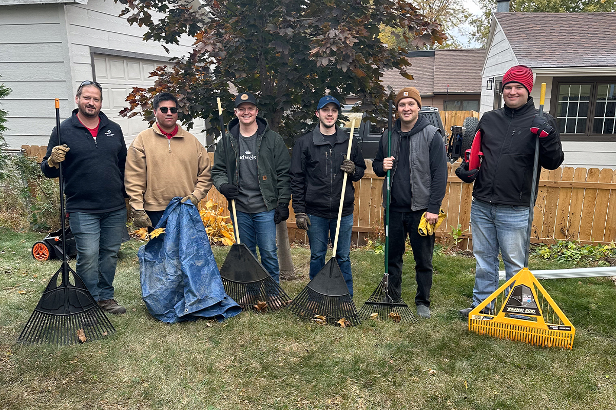 A group of people volunteering with Rake the Town in Sioux Falls.