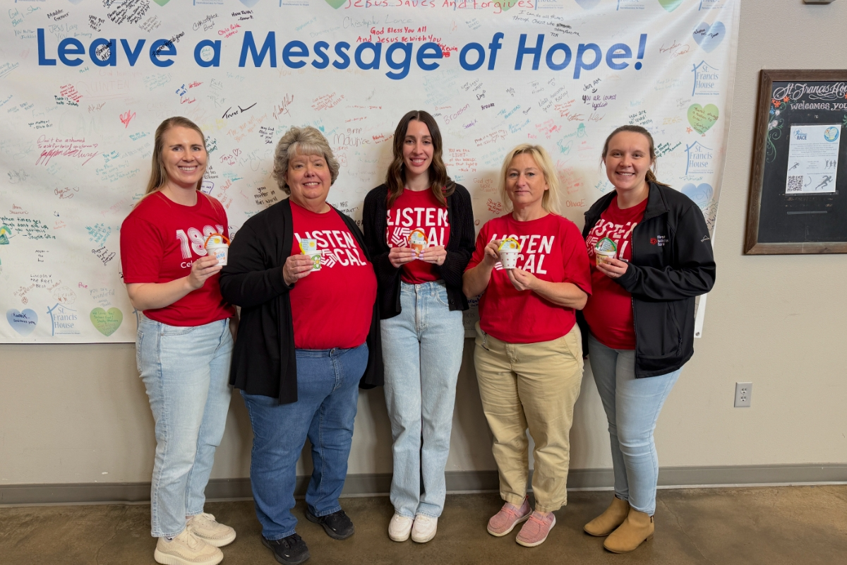 A group of people volunteering at the St. Francis House in Sioux Falls.