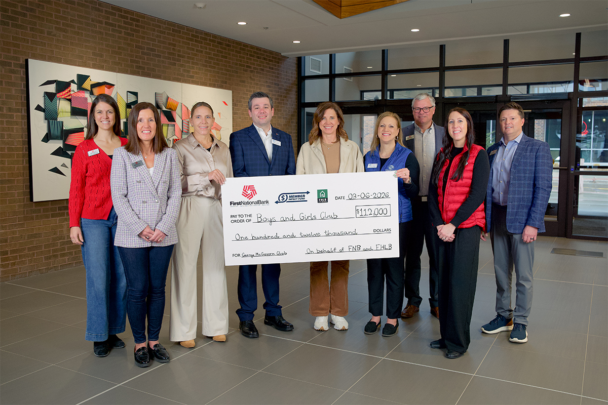 First National Bank presents a check to the Boys and Girls Club of the Sioux Empire.