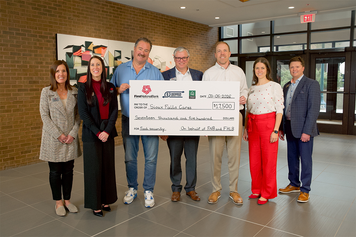 First National Bank presents a check to Sioux Falls Cares.