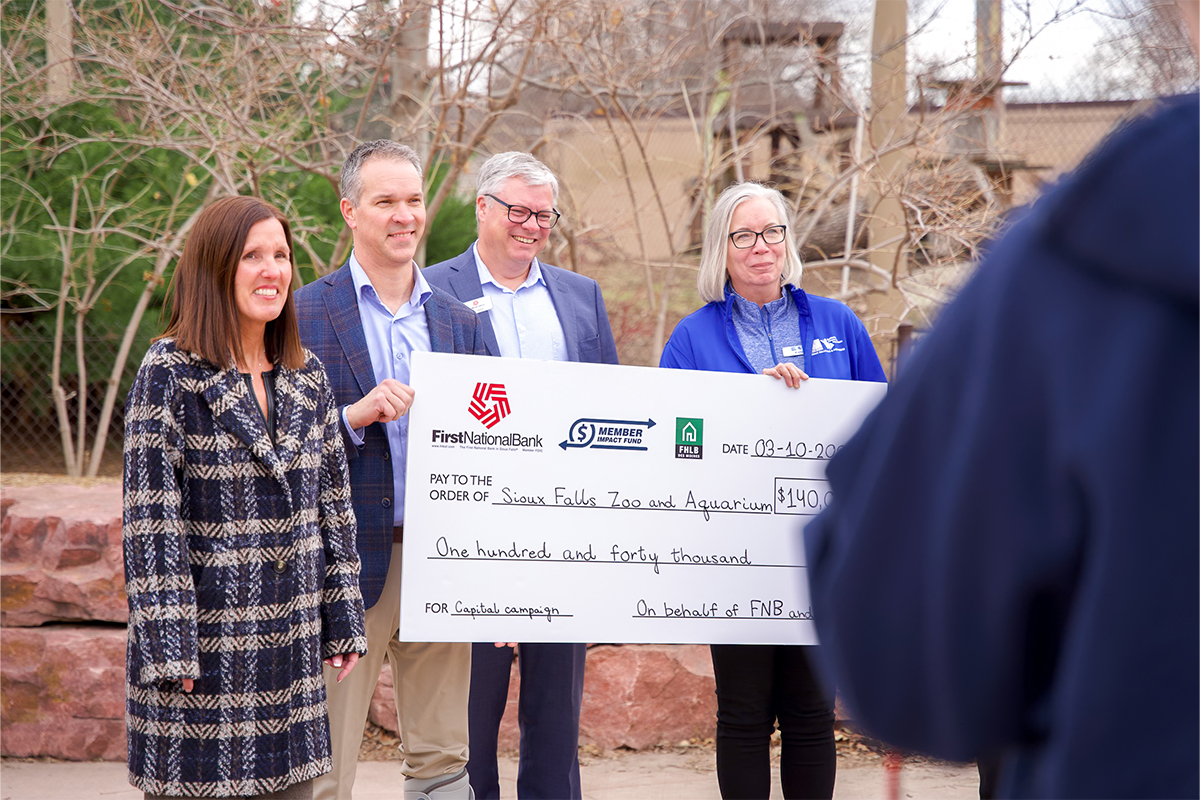 Sarah Hogg speaks at a check presentation to the Sioux Falls Zoo & Aquarium.