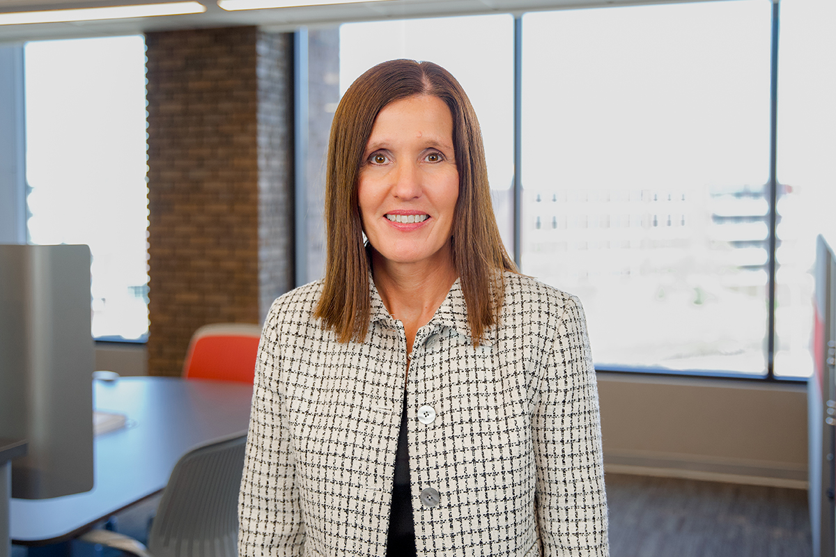 A headshot of Sarah Hogg.