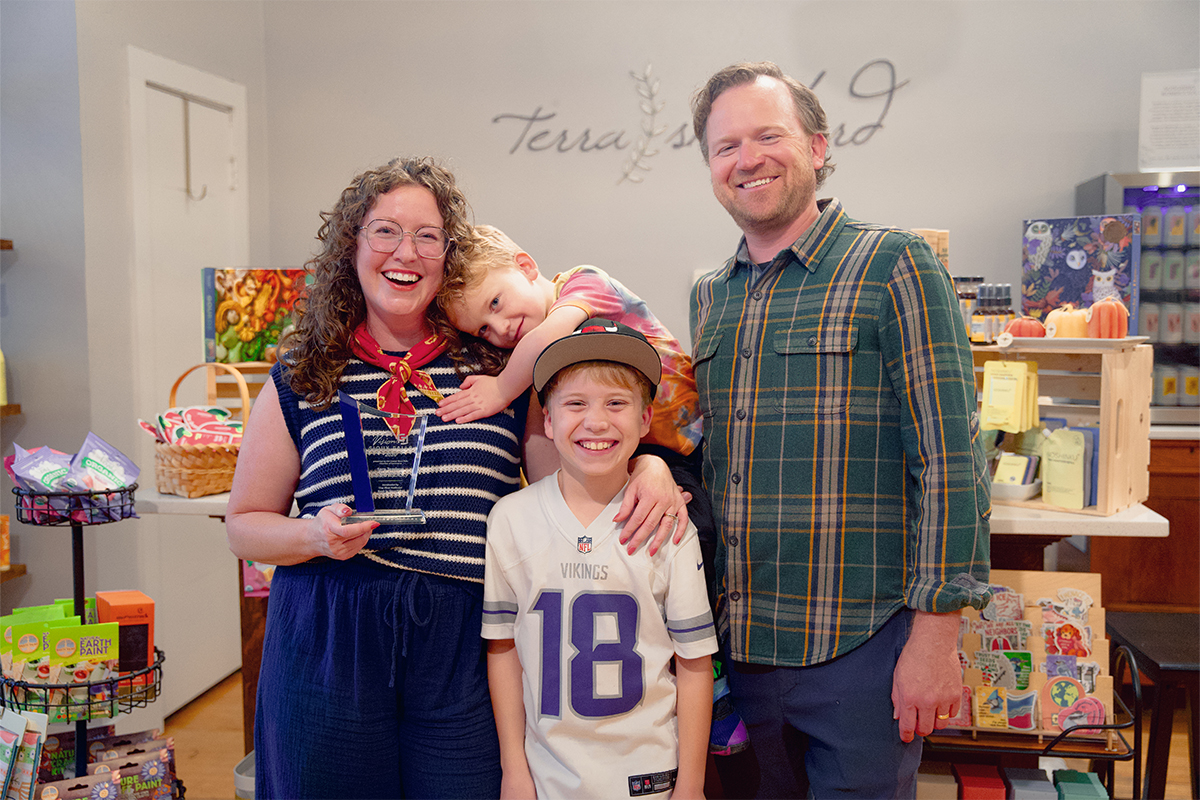 Sara Jamison with her husband and two young sons.